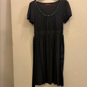Chic Black Dress with Studded Neckline